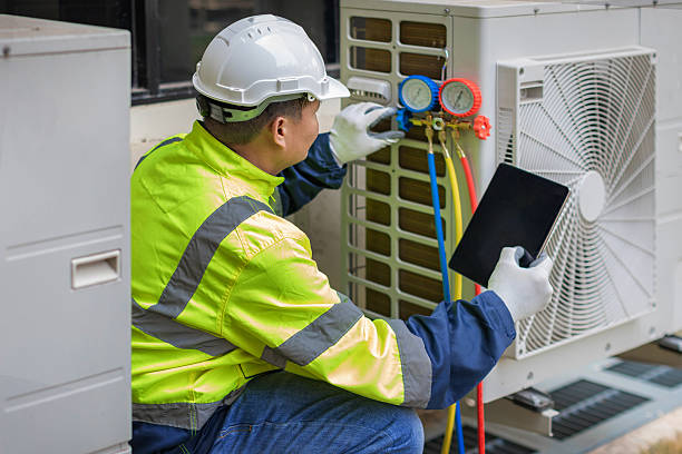 Professional Hvac Maintenance technician working in Southport, NC